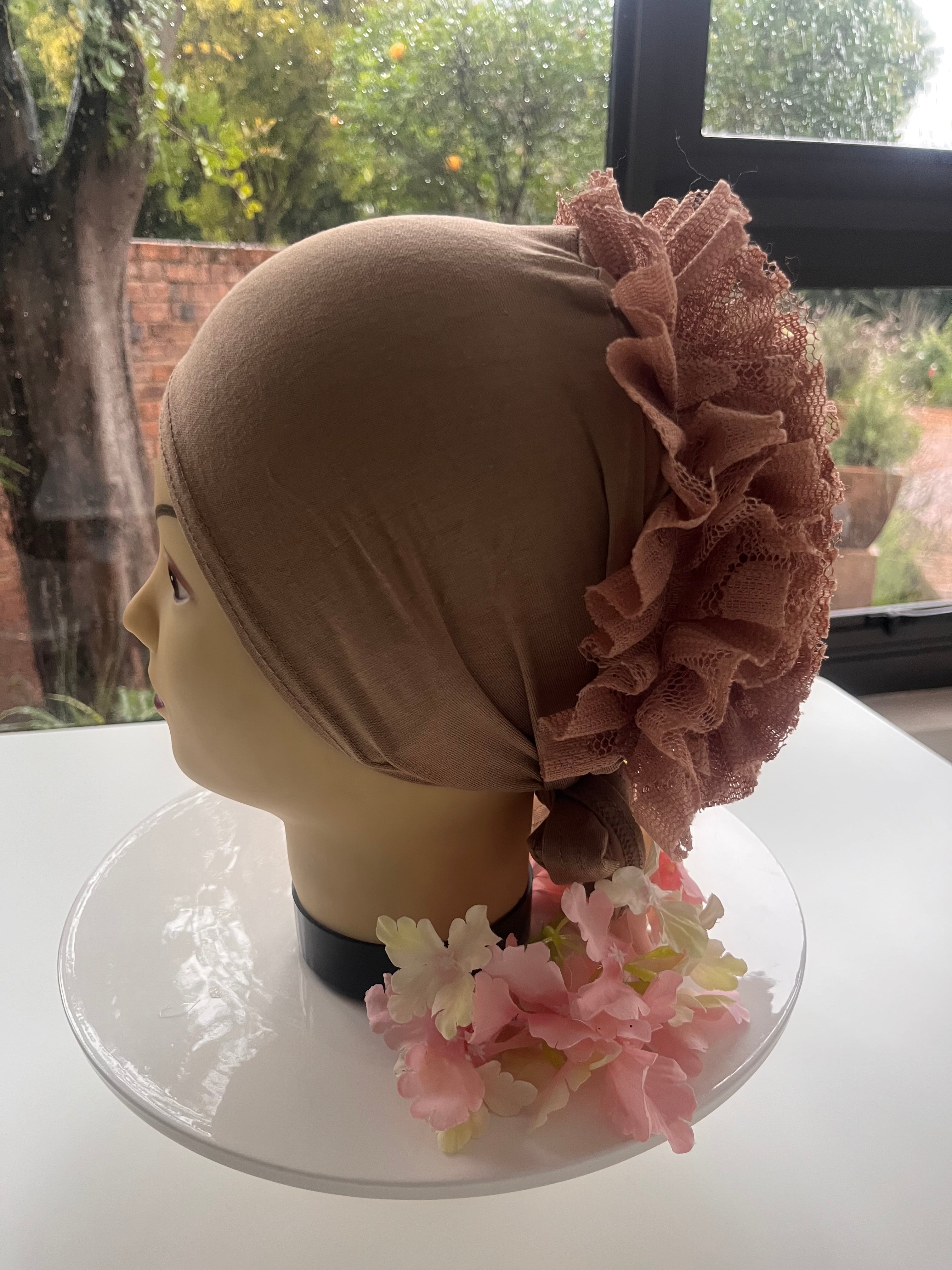 Undercap with volumiser